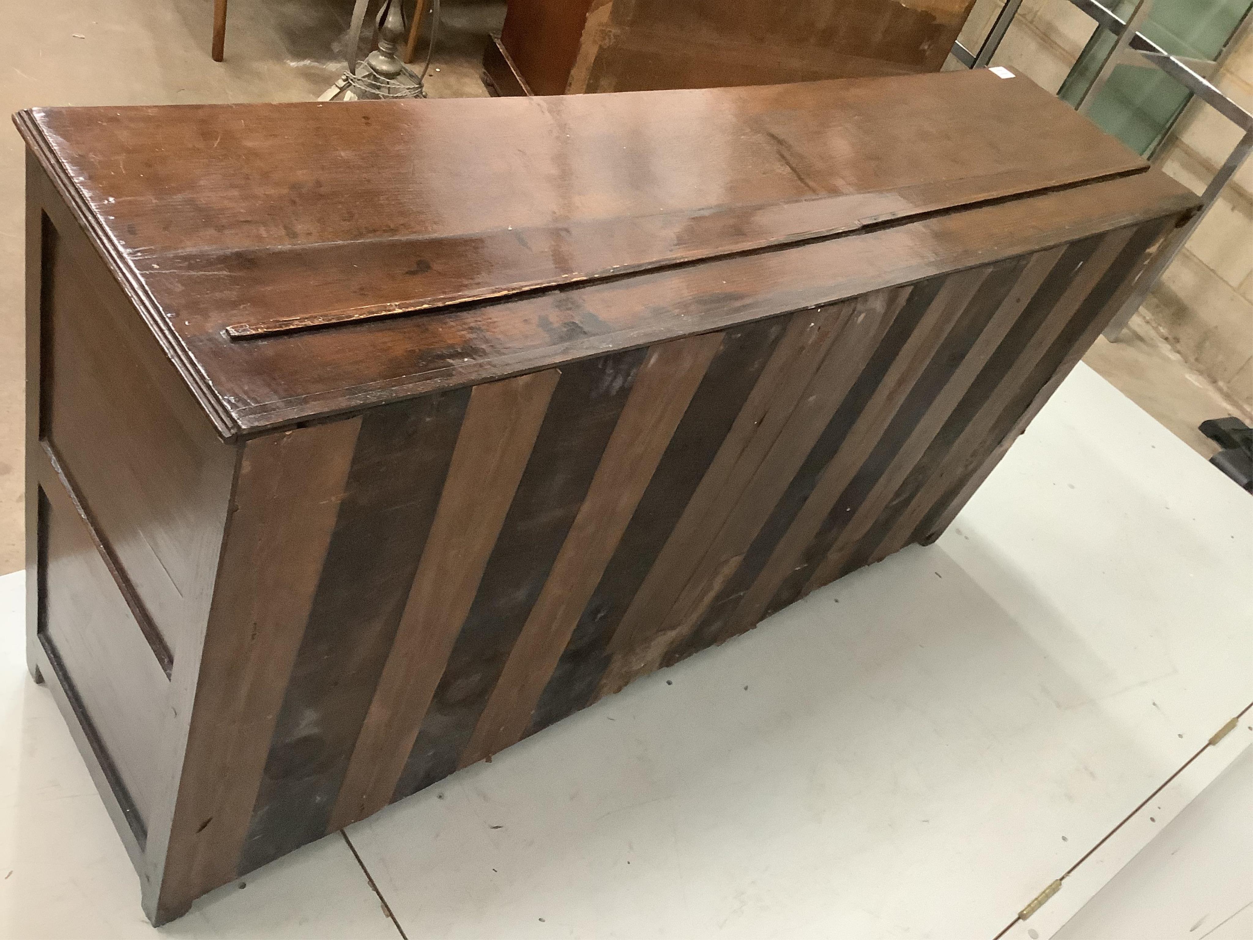An 18th century North Wales oak enclosed dresser with central spindled glass or food compartment, width 163cm, depth 43cm, height 84cm. Condition - light wear but essentially good. Purchased from the specialist oak deale